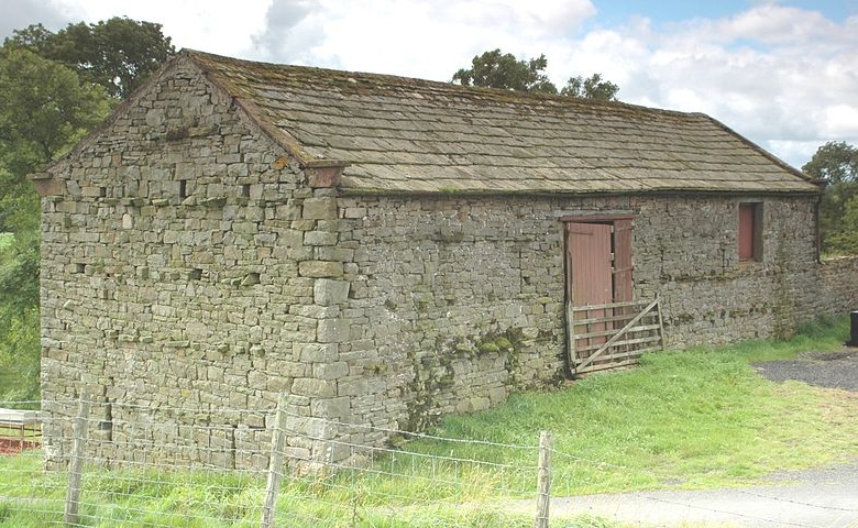 Upper view of stone bank barn in England